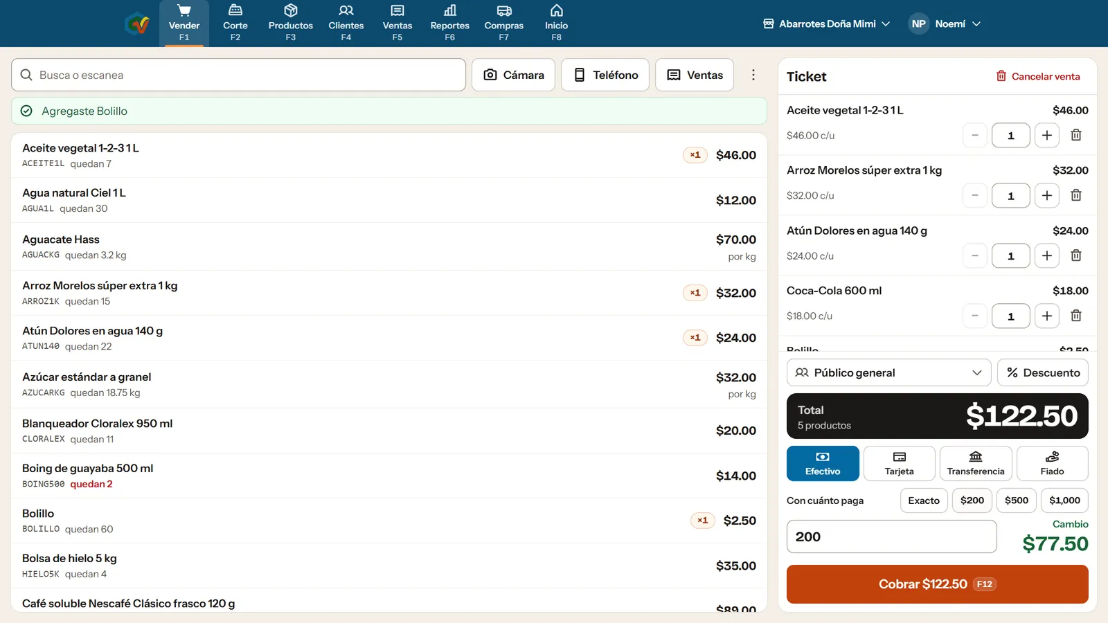 Captura real del punto de venta en la compu: la lista de productos a la izquierda y el ticket con total de $122.50, el cambio y el botón Cobrar